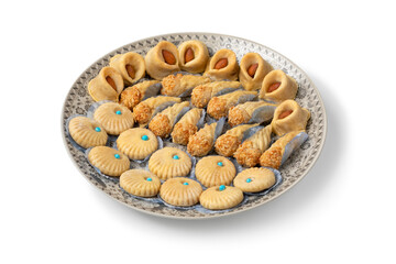 Plate with traditional festive Moroccan cookies isolated on white background close up