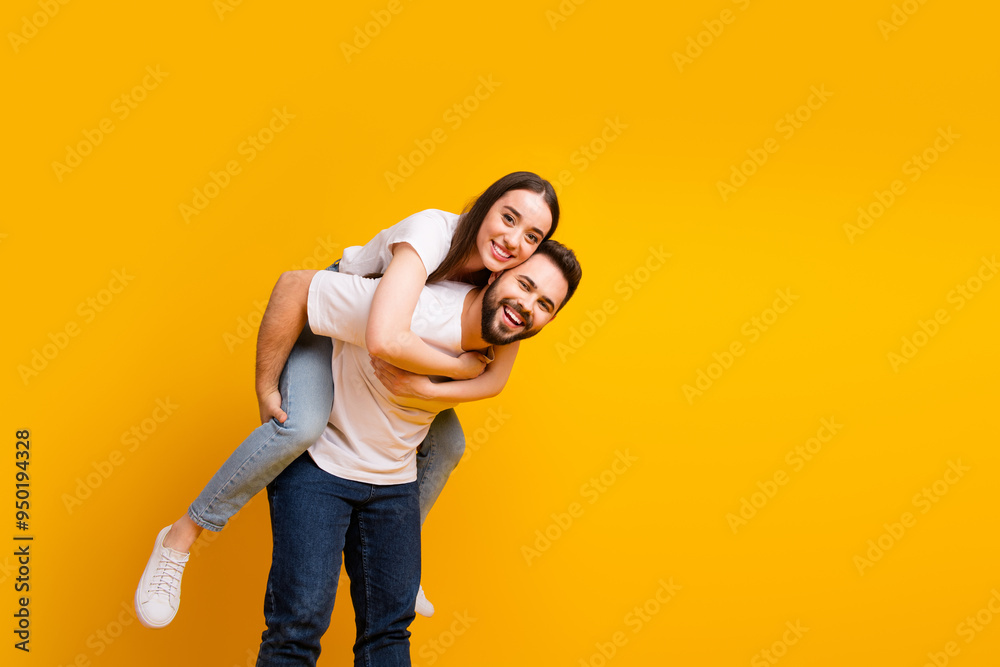 Sticker Photo portrait of lovely young guy girl hugging piggyback dressed stylish white garment isolated on yellow color background