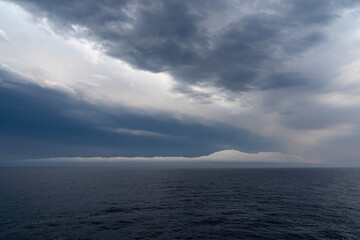 Beautiful clouds on the high seas. Clouds on the high seas background.