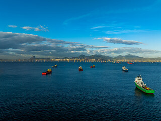 Panoramic view of sea cities. Rio de Janeiro city, bridge, and ships at Guanabara Bay, Brazil.