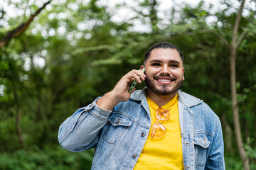 Cheerful lgbtq young man on a call