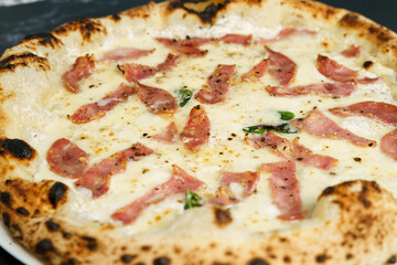 Original Italian pizza with cheese and ham