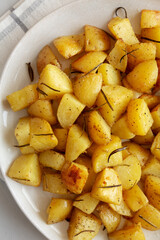 Homemade Oven Roasted Potatoes on a Plate, top view. Flat lay, overhead, from above.