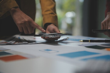 Professional interior designer at workplace in office, closeup