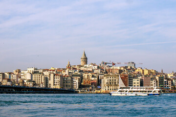 view of historical golden horn (halic) bridge and shorescape of constantinople, istanbul