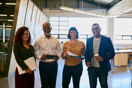 Happy, business people and portrait with team in diversity for interview, meeting or internship at creative startup. Group, employees and smile for inclusion, mission or company growth in recruitment