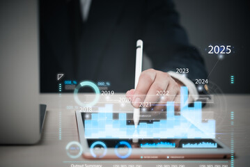 business professional analyzing a digital graph with a pen, highlighting data trends and future growth projections in a corporate environment. Finance, business analysis,
