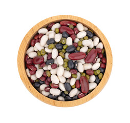 Organic  colors bean on wooden bowl, top view
