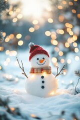 a cute cheerful snowman in the snow in a winter park with beautiful bokeh