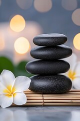 A detailed composition of a spa setting with hot stones on a bamboo surface, surrounded by flowers, captured in soft, diffused light