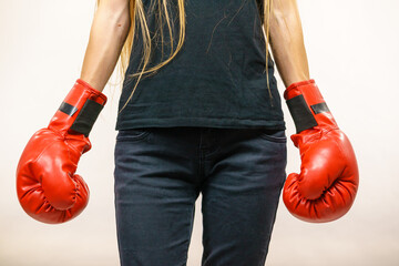 Woman in red boxing gloves