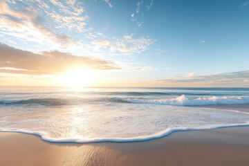 Obraz premium A peaceful morning unfolds as gentle waves kiss the sandy shore under a breathtaking sunrise lighting up the sky.