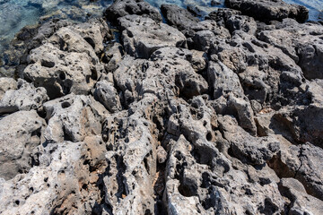 panoramic view of ancient buildings against the backdrop of nature and mountain gardens on a sunny day on the island of Crete in Greece