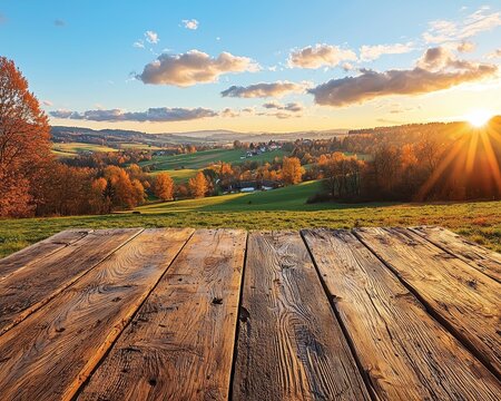 Rustic Wooden Tabletop Overlooking Autumnal Valley with Sun Rays A Peaceful Autumn Scene with a Warm Golden Light