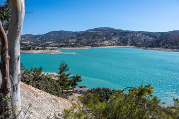 panoramic view of a bay with turquoise water on a sunny day on the island of Crete in Greece