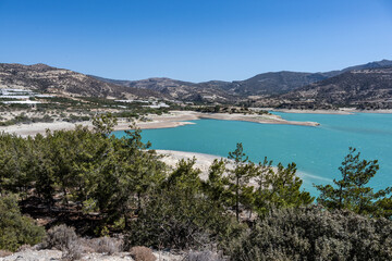 panoramic view of a bay with turquoise water on a sunny day on the island of Crete in Greece