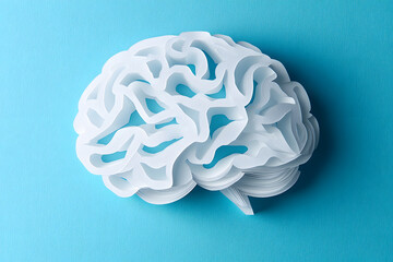 Paper cutout in the shape of a human brain isolated on background medical concepts	