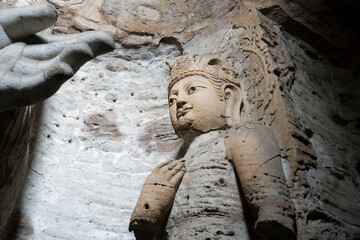 giant stone buddha in Yungang Grottoes in Datong, China