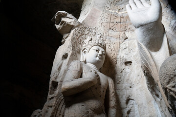 giant stone buddha in Yungang Grottoes in Datong, China