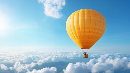 Fototapeta premium Bright yellow hot air balloon floating above the clouds