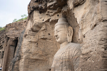 great stone buddhas in Yungang grottoes in Datong,  China