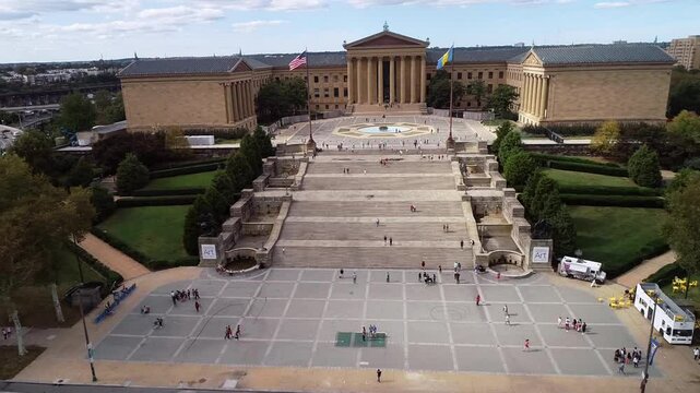 Philadelphia Museum of Art and Rocky Steps. Ericsson Fountain, Eli Kirk Price Fountain, The Oval in Foreground. Pennsylvania. Bright Sunny Day. Drone