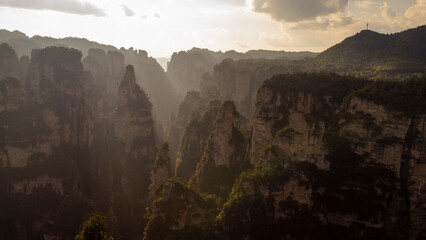 sunset in the sandstone formations of National Forest Park of Zhangjiajie in China