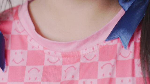 4K Close-up child's mouth pulling out milk tooth. A beautiful little girl 6-7 years old has lost milk teeth, replacement of permanent teeth. Children is dentistry.