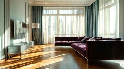 Sleek decor with a plum couch, metal TV stand, and hardwood floors under pale blue curtains.