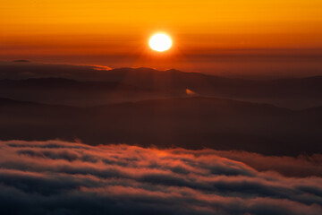 The sun as the protagonist of the sunset in the mountains of Asturias, Spain, on a summer day!