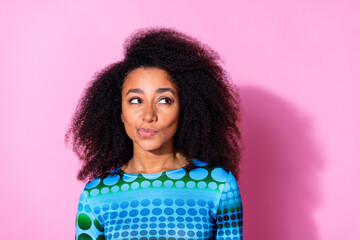 Photo portrait of pretty young girl look interested cunning empty space wear trendy blue outfit...