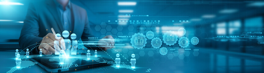 Businessman analyzing teamwork data and team growth graph collaboratively on office table with tab, discussing, sharing insights, reviewing strategies, planning, optimizing performance, aligning goals