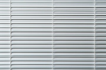 Obraz premium Mini Blinds. Closed White Plastic Shutter Blinds with Intricate Line Texture