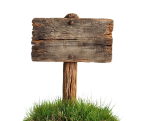 Weathered wooden signboard in grass, cut out