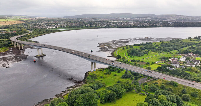 Aerial view of the Foyle Bridge over the river Foyle and Derry Londonderry Northern Ireland