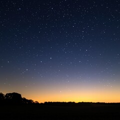 Twilight Transition: Beautiful Clear Night Sky with Emerging Stars on the Horizon
