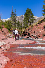 Mother Hiking with Child in Scenic Mountain Landscape