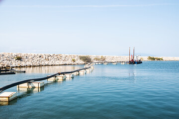 Fototapeta premium Dredger ship in Mediterranean port on sunny summer day