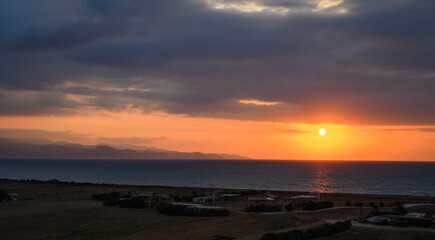 colorful sunset sky over the Mediterranean sea and mountains island of Cyprus