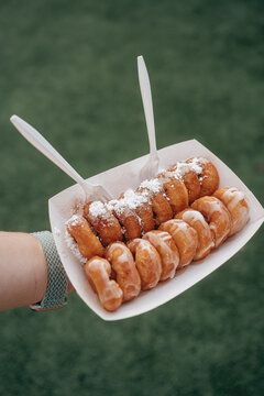 Mini donuts with icing and decorated background