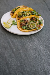 Homemade beef tortilla with grilled jalapeño, onion and cilantro