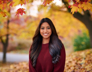 Happy Woman's Autumn Portrait: Outdoor Headshot with Smiling Expression and Copyspace