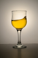 Fresh apple juice in a glass beaker isolated on a white background