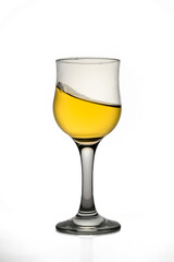 Full glass of apple juice in sunlight
