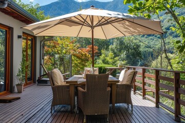Fototapeta premium A deck with a table chairs and umbrella set up for outdoor dining
