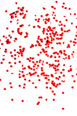 flying gold red colorful confetti isolated on white background 
