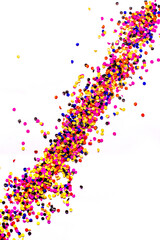 flying gold red colorful confetti isolated on white background 