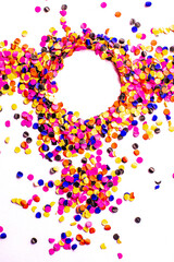 flying gold red colorful confetti isolated on white background 