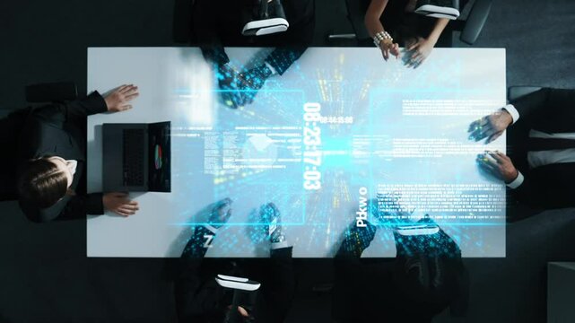 Top view of diverse data analysts wearing VR headsets and enter software database while using hand gestures to manipulate programing engineering prompt from the manager laptop. Directorate.