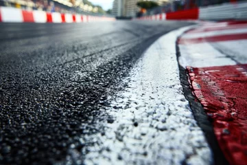 Rolgordijnen zonder boren Detailed shot of Monaco s Grand Prix street circuit with asphalt texture and white curbs © VolumeThings